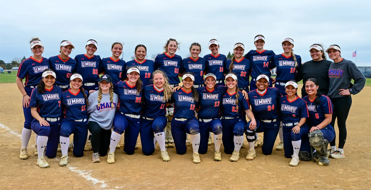 UM Softball team photo out on field 